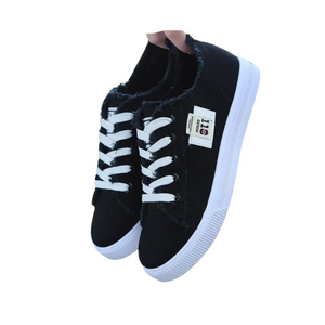 Zapatillas Unisex de Lona Negra con Acabado Desgastado y Suela Plana Estilo Retro Urbano
